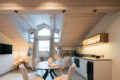 Küchenzeile mit Essbereich und TV im Boutique Apart Serfaus